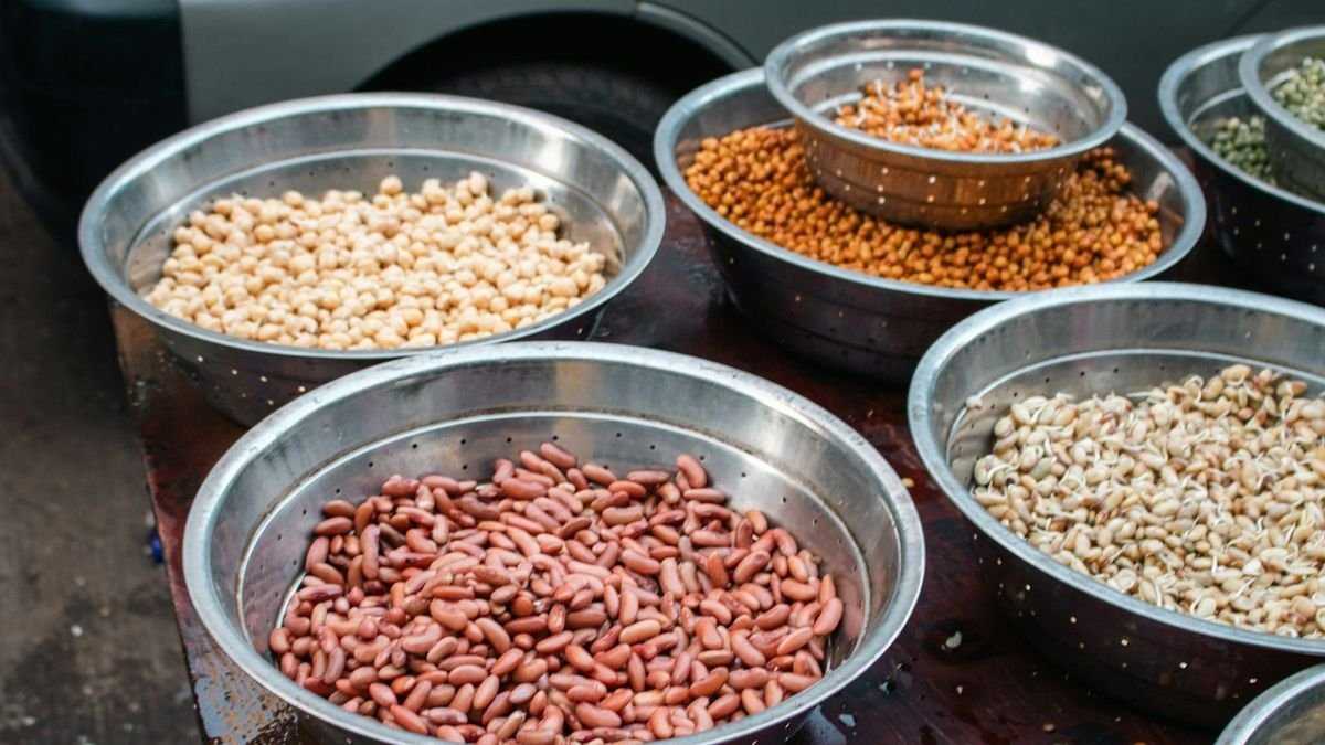 Bowls of assorted dried beans and legumes, among the highest-fiber foods
