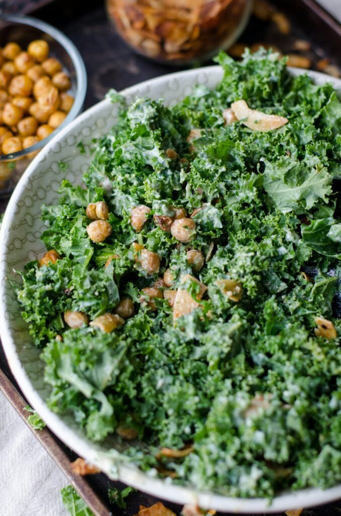 Close-up of a kale salad with chickpeas in a bowl